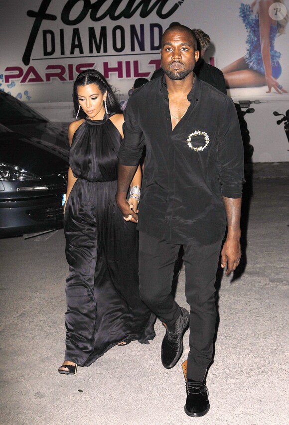Kim Kardashian et Kanye West à Ibiza, le 2 août 2014.