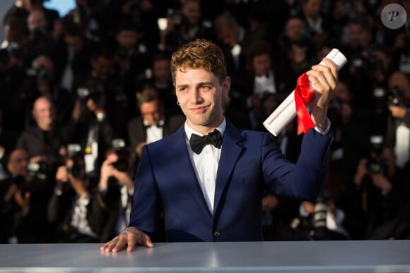 Xavier Dolan, Prix du Jury pour "Mommy" - Photocall de la remise des palmes du 67e Festival du film de Cannes le 24 mai 2014.