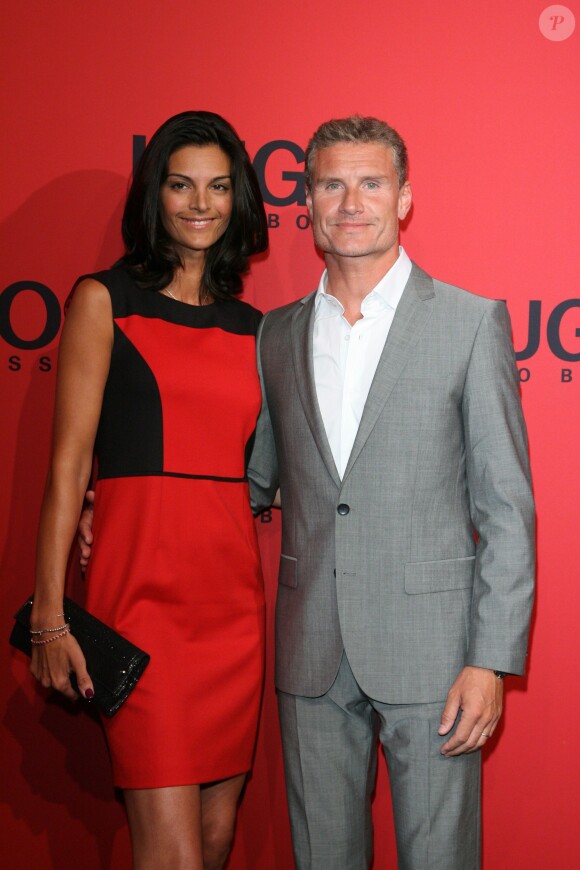 David Coulthard et Karen Minier lors du Hugo Boss Spring-Summer 2013 fashion show à Berlin, le 5 juillet 2012