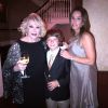 Joan Rivers entourée de sa fille Melissa et de son petit-fils Cooper, le 24 juin 2012.