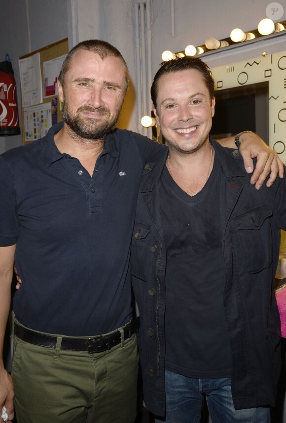 Alexandre Brasseur et Davy Sardou au Théâtre Rive-Gauche, après une représentation de la pièce "Georges et Georges", à Paris, le 2 septembre 2014.