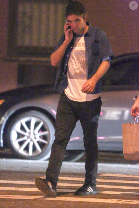 Robert Pattinson, Tom Sturridge et des amis à New York le 28 août 2014.