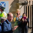Le prince William en visite à Oxford le 8 septembre 2014, jour de la révélation de la seconde grossesse de son épouse Kate Middleton, qui n'a pas pu l'accompagner pour raisons de santé.