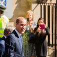 Le prince William en visite à Oxford le 8 septembre 2014, jour de la révélation de la seconde grossesse de son épouse Kate Middleton, qui n'a pas pu l'accompagner pour raisons de santé.