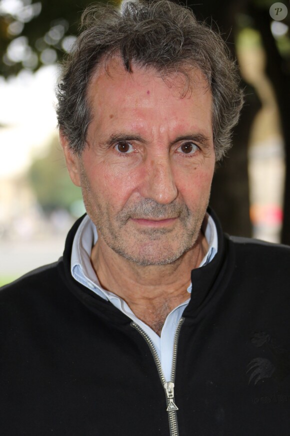 Jean-Jacques Bourdin - Tournoi de pétanque organisé par Meghanora au profit de la recherche médicale pédiatrique sur la Place des Invalides à Paris le 29 septembre 2013.