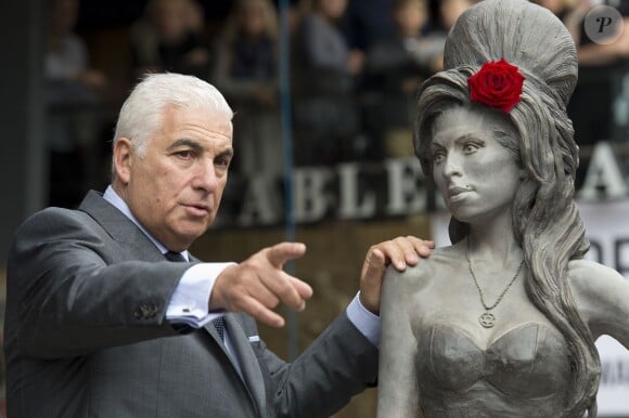 Mitch Winehouse, the father of the late Amy Winehouse, stands next to a statue of his daughter following its unveiling on what would have been the singer's 31st birthday, at the Stables Market, Camden Town , London, UK on September 14, 2014. Photo by Laura Lean/PA Photos/ABACAPRESS.COM15/09/2014 - London