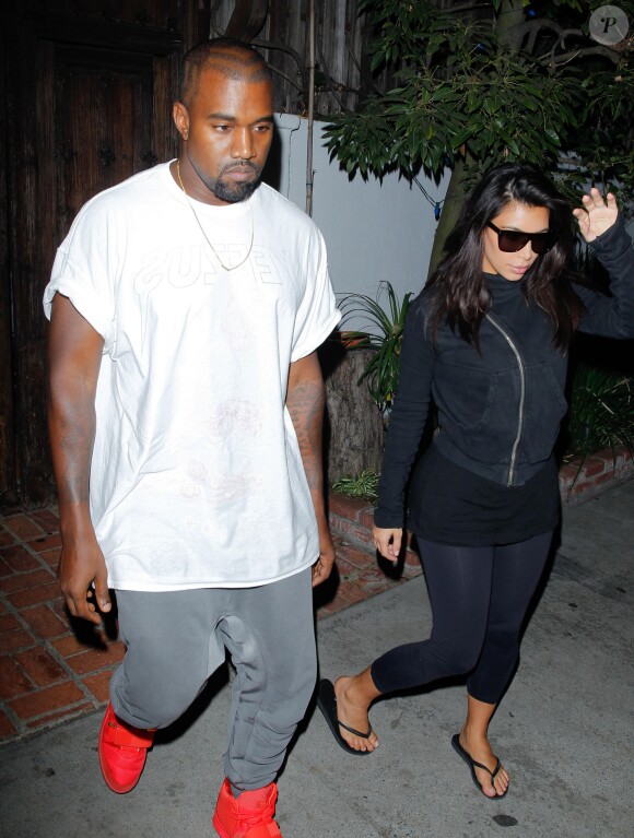 Kim Kardashian et Kanye West quittent le restaurant The Little Door à Los Angeles, le 16 septembre 2014.