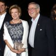 Le roi Constantin de Grèce et la reine Anne-Marie radieux    au Musée de l'Acropole d'Athènes le 17 septembre 2014 pour le dîner organisé à l'occasion de leurs 50 ans de mariage, à la veille de la fête des noces d'or au Yacht Club du Pirée. 