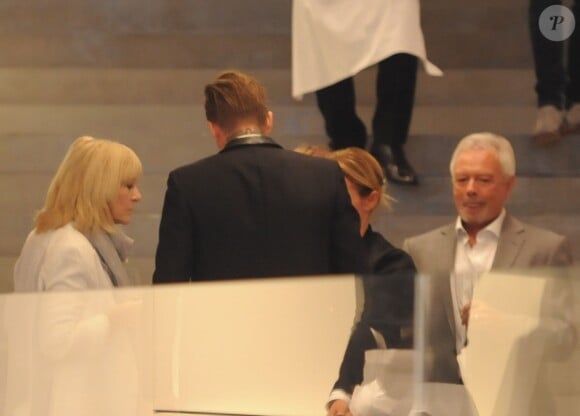 David Beckham, les parents de Victoria Beckham, Anthony et Jackie Adams et sa soeur Louise Adams sont dans la nouvelle boutique Victoria Beckham, le jour de son ouverture, à Londres, le 25 septembre 2014. 