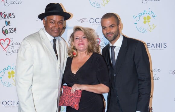 Tony Parker et ses parents Tony et Pamela - 9e édition du "Par Coeur Gala" à Lyon le 25 septembre 2014.