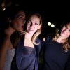 Sofia Essaïdi, Claire Keim et Camille Lou mises en lumière lors de la soirée de lancement de l'album Forever Gentlemen 2 le 1er octobre 2014 à bord de la péniche Le Paris, au pied de la Tour Eiffel. Sortie du disque le 20 octobre.
