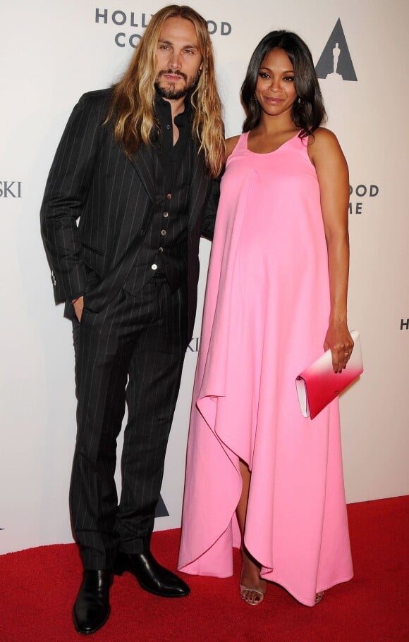 Zoe Saldana et son mari Marco Perego à l'Academy Of Motion Picture Arts And Sciences Hollywood Costume Opening Party à Los Angeles, le 2 octobre 2014.