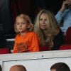 Helena Seger et son fils Maximillian lors du match entre le PSG et Saint-Etienne au Parc des Princes à Paris le 31 aout 2014