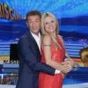 Ezio Greggio et Michelle Hunziker, enceinte, durant l'enregistrement de l'émission "Striscia la Notizia" à Milan le 13 octobre 2014.
