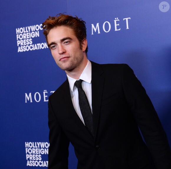 Robert Pattinson - Dîner pour la presse étrangère "The Hollywood Foreign Press Associations Grants Banquet" à Beverly Hills, le 14 août 2014.