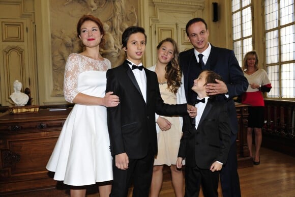 Exclusif - Emilie Dequenne, sa fille Milla, 12 ans, son époux Michel Ferracci, et ses deux fils Enzo, 13 ans, et Maël, 8 ans - Mariage de Michel Ferracci et Emilie Dequenne à la mairie du 10e arrondissement, le samedi 11 octobre 2014 à Paris.