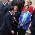 Ségolène Royal, ministre de l'Ecologie, du Développement durable et de l'Energie et François Hollande, le président de la République posent pour la photo de famille au palais de l'Elysée à Paris, le 4 avril 2014 pendant le premier conseil des ministres du nouveau gouvernement.