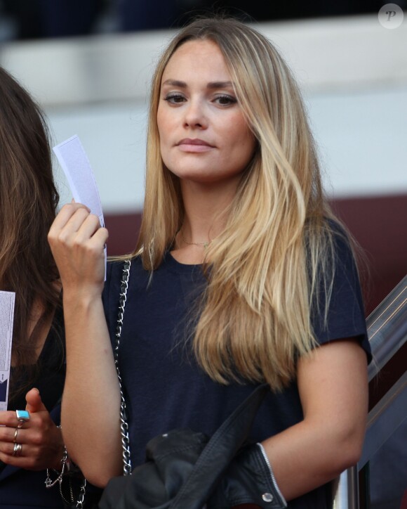 Joy Esther assiste au Match de football PSG-Guingamp à Paris le 31 août 2013.