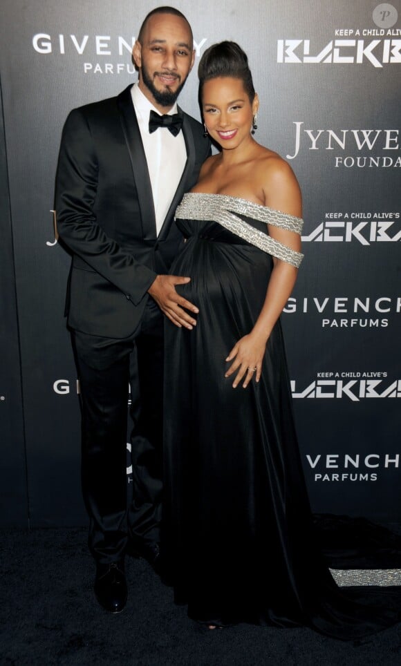 Swizz Beatz et Alicia Keys (enceinte) lors de la soirée "Keep A Child Alive Black Ball" organisée jeudi 30 octobre 2014 à New York.