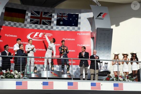 Lewis Hamilton sur la plus haute marche du podium devant Nico Rosberg et Daniel Ricciardo après le Grand Prix des Etats-Unis à Austin, le 2 novembre 2014