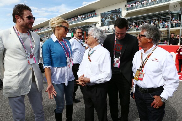 Bernie Ecclestone, Mario Andretti, Simon Le Bon, Pamela Anderson et Keanu Reeves dans le paddock du Grand Prix des Etats-Unis à Austin, le 2 novembre 2014
