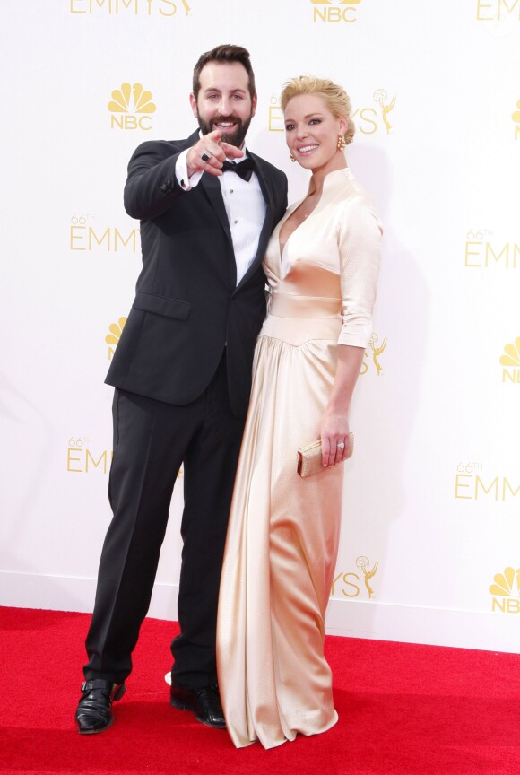Katherine Heigl et son mari Josh Kelley lors de la 66ème cérémonie annuelle des Emmy Awards au Nokia Theatre à Los Angeles, le 25 août 2014.