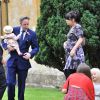 Sam Cooper et Lily Allen (enceinte) avec leur fille Ethel à Gloucestershire, le 1er septembre 2012. 