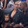 Kim Kardashian, Kanye et North West assistent au défile Givenchy printemps-été 2015. Paris, le 28 septembre 2014.