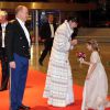 La princesse Caroline de Hanovre reçoit un bouquet de fleurs aux couleurs de la principauté, sous les yeux du prince Albert II de Monaco, d'Andrea Casiraghi et de son épouse Tatiana Santo Domingo, enceinte, lors du gala de clôture de la Fête nationale monégasque, le 19 novembre 2014 au Grimaldi Forum.