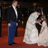 La princesse Caroline de Hanovre accueillie avec un bouquet de fleurs aux couleurs de la principauté lors du gala de clôture de la Fête nationale monégasque, le 19 novembre 2014 au Grimaldi Forum.
