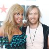 Cathy et David Guetta inaugurant leur club à l'aéroport d'Ibiza le 17 juillet 2012