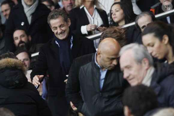 Nicolas Sarkozy (et, au premier plan, Eric Judor) au Parc des Princes lors de PSG-Nice (1-0) le 29 novembre 2014. 