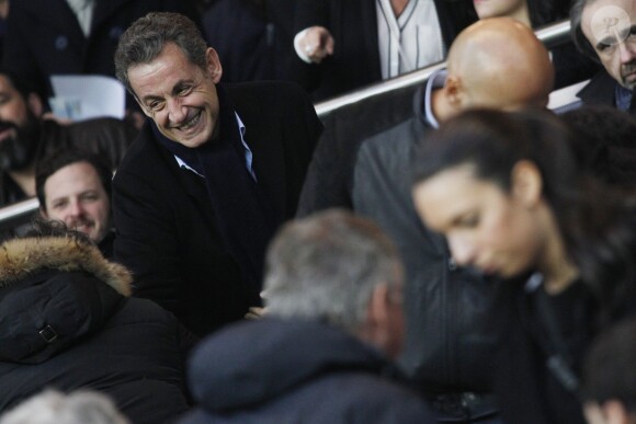 Nicolas Sarkozy dans la tribune d'honneur au Parc des Princes lors de PSG-Nice (1-0) le 29 novembre 2014. 