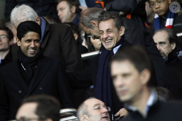 Nasser Al-Khelaïfi et Nicolas Sarkozy hilares au Parc des Princes lors de PSG-Nice (1-0) le 29 novembre 2014. 
