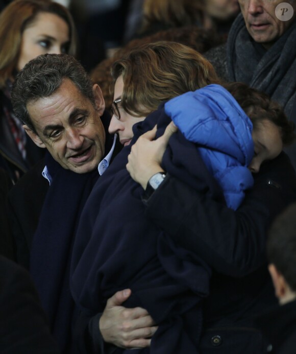 Nicolas Sarkozy, son fils Jean Sarkozy et son petit-fils Solal au Parc des Princes lors de PSG-Nice (1-0) le 29 novembre 2014. 