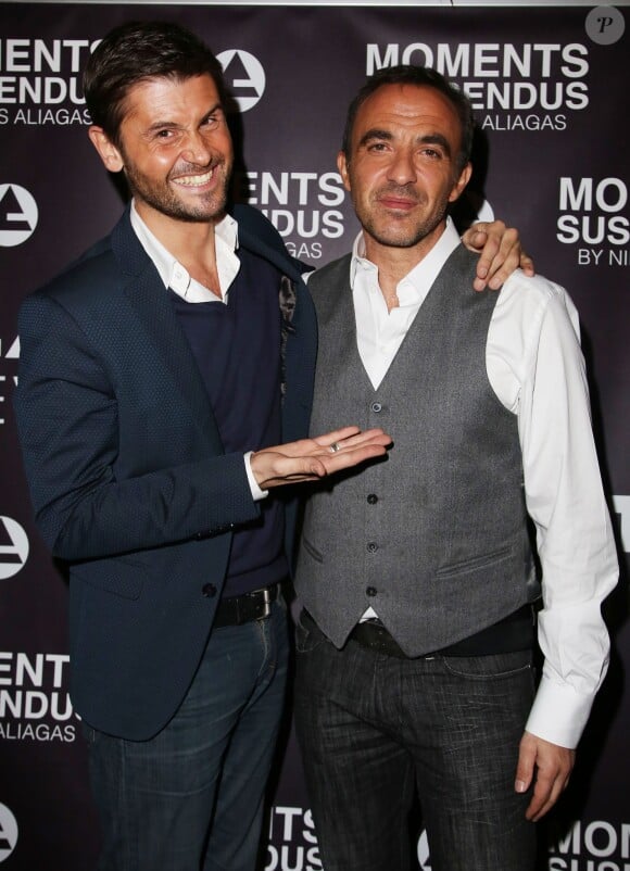 Exclusif - Nikos Aliagas et Christophe Beaugrand - Vernissage de l'exposition "Moments Suspendus" de Nikos Aliagas à l'Atlantis TV à Boulogne-Billancourt, le 3 décembre 2014.