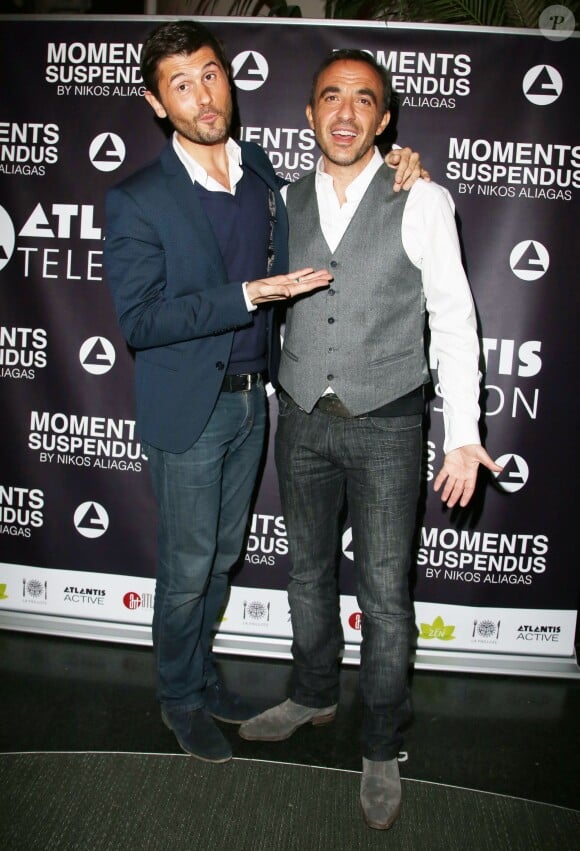 Exclusif - Nikos Aliagas et Christophe Beaugrand - Vernissage de l'exposition "Moments Suspendus" de Nikos Aliagas à l'Atlantis TV à Boulogne-Billancourt, le 3 décembre 2014.