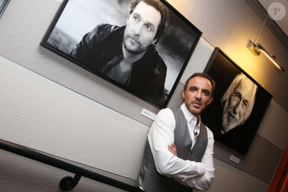 Exclusif - Nikos Aliagas - Vernissage de l'exposition "Moments Suspendus" de Nikos Aliagas à l'Atlantis TV à Boulogne-Billancourt, le 3 décembre 2014.