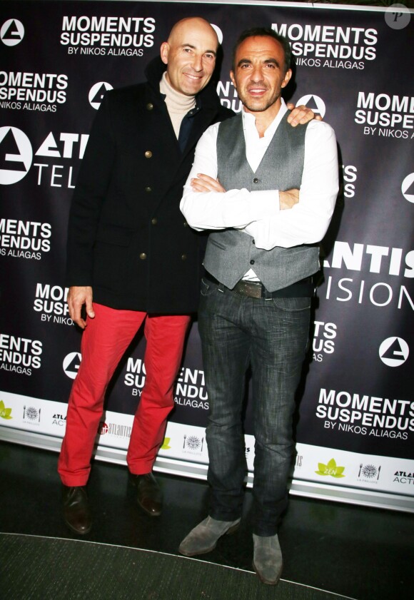 Exclusif - Nikos Aliagas et Nicolas Canteloup - Vernissage de l'exposition "Moments Suspendus" de Nikos Aliagas à l'Atlantis TV à Boulogne-Billancourt, le 3 décembre 2014.