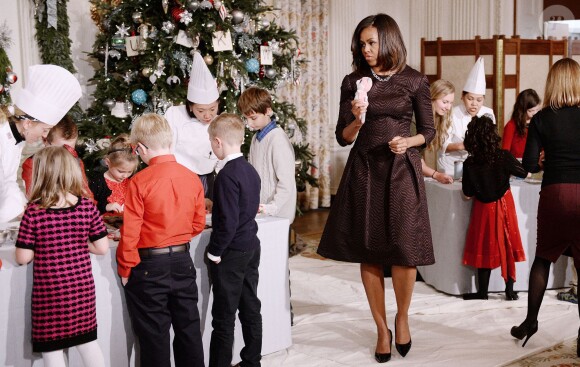 La sympathique Michelle Obama a reçu des familles de militaires à la Maison Blanche, pour découvrir les décorations de Noël, le 3 décembre 2014