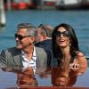 George Clooney et sa fiancée Amal Alamuddin arrivent à Venise le 26 septembre 2014 où ils vont célébrer leur mariage, prévu lundi 29 septembre.
