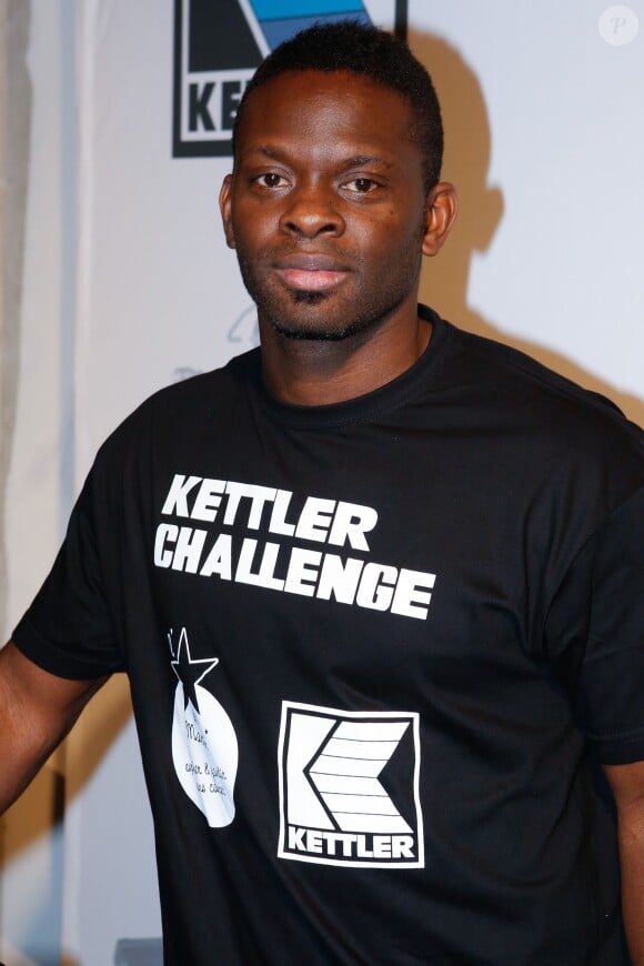 Louis Saha lors du Kettler Challenge au profit de l'association "L'étoile de Martin" à l'hôtel Molitor à Paris, le 1er décembre 2014