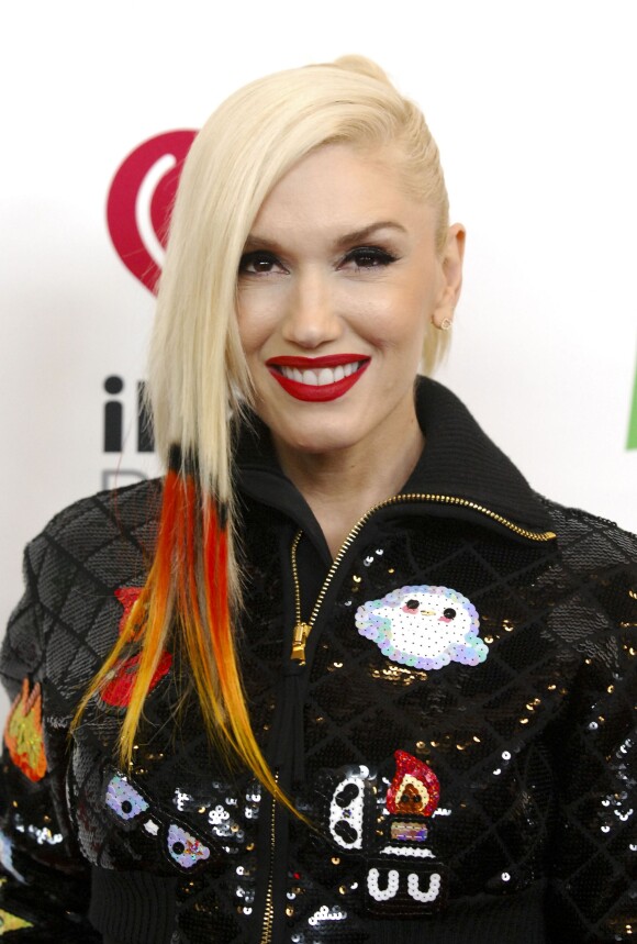 Nouveau look pour Gwen Stefani, qui affiche son dégradé orangé lors du concert de Noël de la radio KIIS FM (KIIS FM's Jingle Ball) au Staples Center. Los Angeles, le 5 décembre 2014.