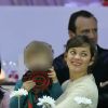 Marion Cotillard complice et tendre avec son fils Marcel au quatrième jour des Gucci Paris Masters 2014 à Villepinte le 7 décembre 2014