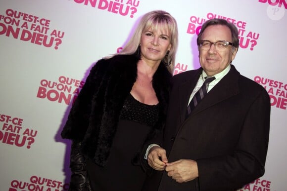 Nonce Paolini et sa femme lors de la soirée "Qu'est-ce qu'on a fait au bon Dieu" au Showcase, Paris, le 8 décembre 2014.