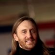 David Guetta, sur le tapis rouge de la 16e édition des NRJ Music Awards à Cannes, le samedi 13 décembre 2014.