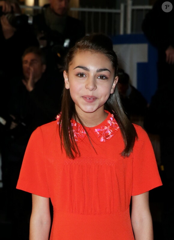 Carla, gagnante de The Voice Kids, sur le tapis rouge de la 16e édition des NRJ Music Awards à Cannes, le samedi 13 décembre 2014.