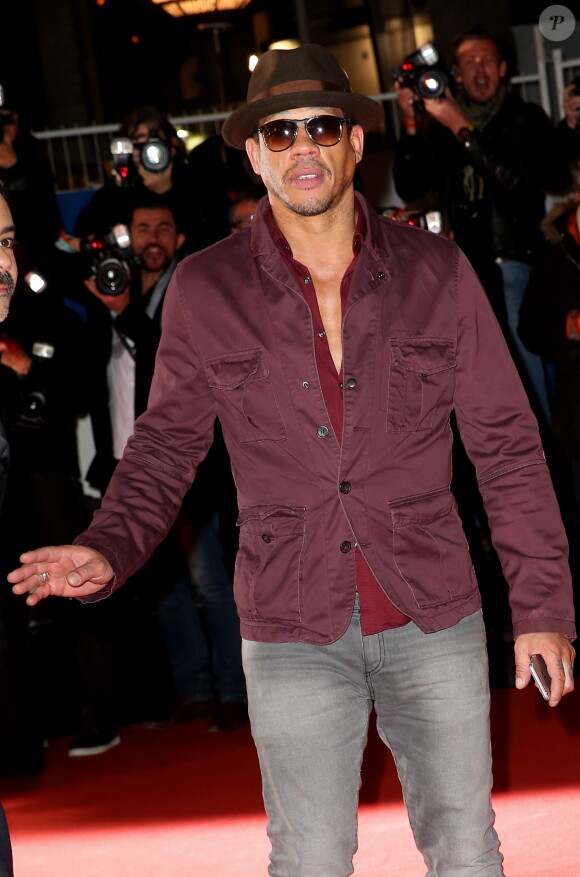 JoeyStarr, sur le tapis rouge de la 16e édition des NRJ Music Awards à Cannes, le samedi 13 décembre 2014.
