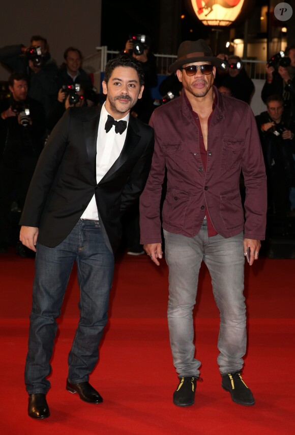 Manu Payet et JoeyStarr, sur le tapis rouge de la 16e édition des NRJ Music Awards à Cannes, le samedi 13 décembre 2014.