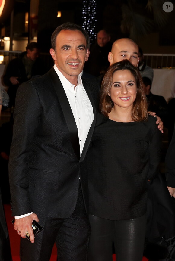 Nikos Aliagas et sa soeur Maria, sur le tapis rouge de la 16e édition des NRJ Music Awards à Cannes, le samedi 13 décembre 2014.